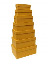 Набор из семи прямоугольных подарочных коробок жёлтого цвета, отделка матовой фактурной бумагой, размер 28*18*11,5 см.