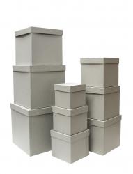 Набор из девяти подарочных коробок куб светло-серого цвета, отделка матовой фактурной бумагой, размер 25*25*25 см.