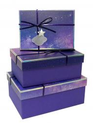 Набор из трёх прямоугольных подарочных коробок "Космос" фиолетового цвета с бантом из шнура, отделка матовой бумагой с рисунком, размер 22*16*9,5 см.