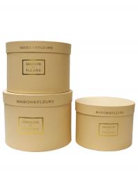 Набор из трёх круглых подарочных коробок кремового цвета, отделка матовой бумагой с тиснением, размер d27*h20 см.