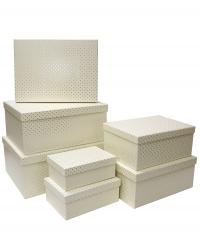 Набор из семи прямоугольных подарочных коробок молочного цвета, отделка матовой бумагой с тиснением серебряными точками, размер 35*27*16 см.